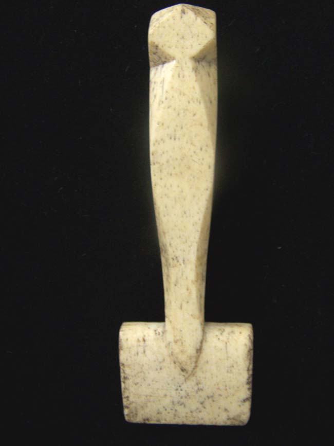 A 19th century Carved ANTIQUE Whalebone Seam Rubber with diamond pattern knob — image 3